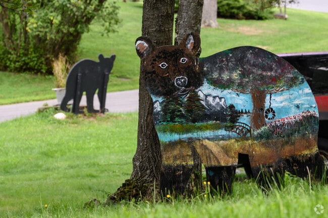 Hand-painted bear cutouts are a common motif seen throughout the yards of Cragsmoor, NY.