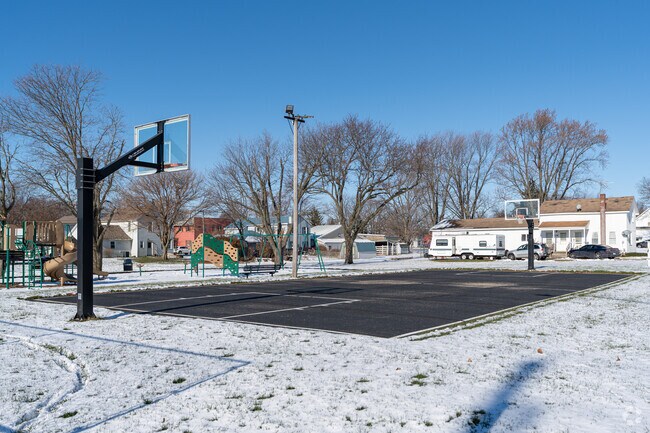 Join a pickup basketball game at the John Moore Play Ground, in Lisbon, IL.