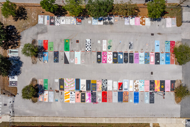 Tavares High School senior parking lot filled with personal painted spaces.