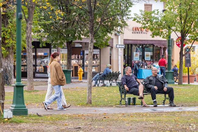 Tourists and locals all enjoy the Santa Fe Plaza in Historic Saint Catherine's.