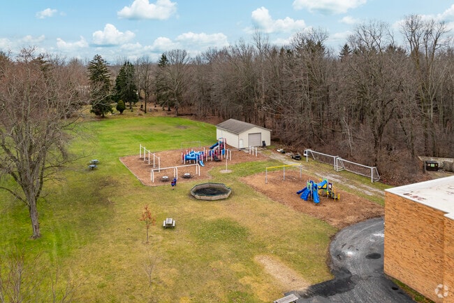A modest playground behind St John's Lutheran School provides students space to stretch out.