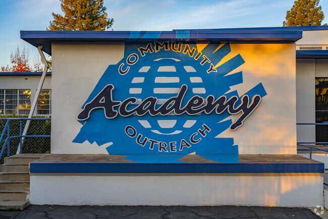 Community Outreach Academy Elementary School sign welcomes students to come and learn.
