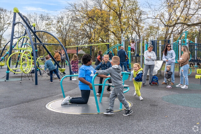 Kids love the built-in merry-go-round at Independence Park in Frances-Stones Crossing.