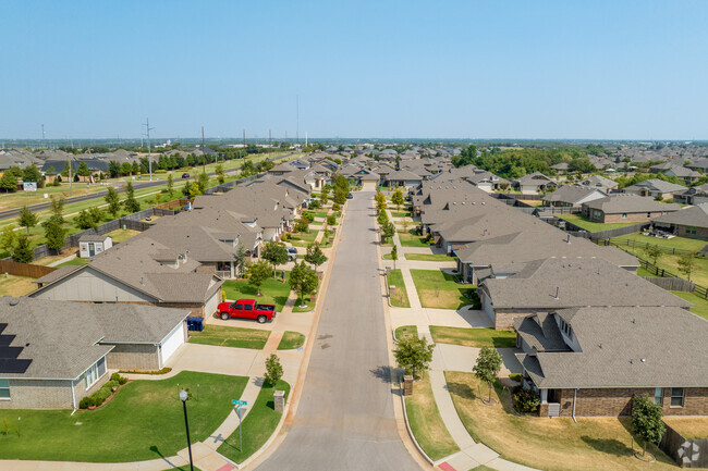 Many of the homes in Spring Creek have sidewalks running through the front yards.