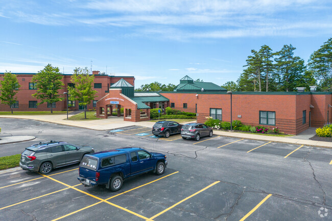 Side view of the front of Raymond Elementary School.