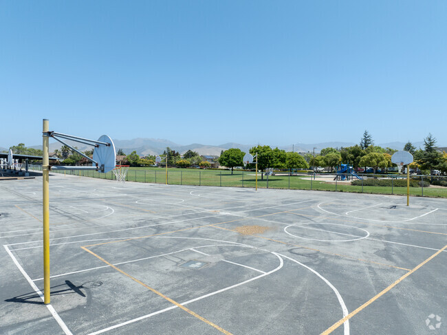 Engage in fun and fitness at the basketball playground of Creekside Elementary in Salinas.