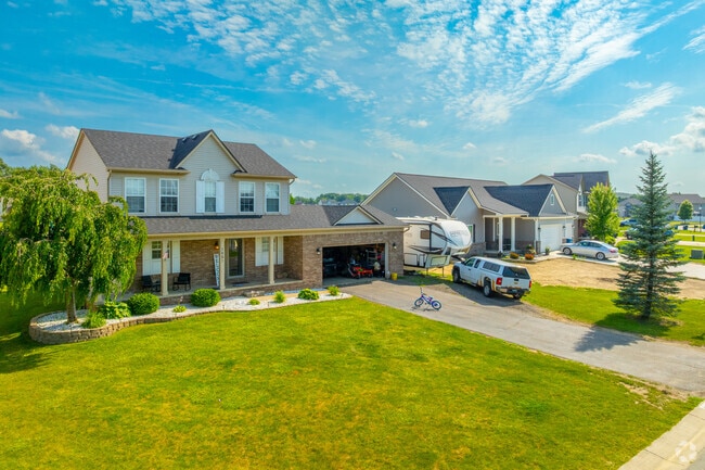 New Traditional homes are nestled on multiple acre lots.