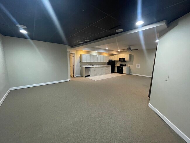 Living area looking into kitchen