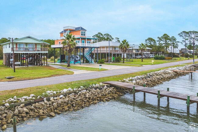 There are some remodeled, elevated waterfront homes in Coden.