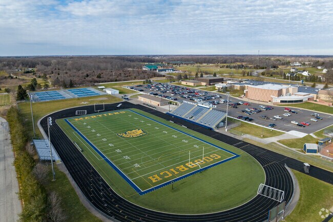 The Goodrich High School campus includes several ball fields and a football stadium.