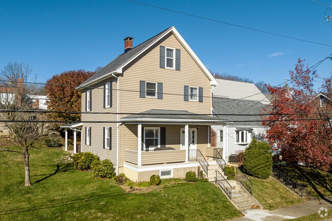 This orientation of this Youngwood colonial gives it a definite farmhouse feel.