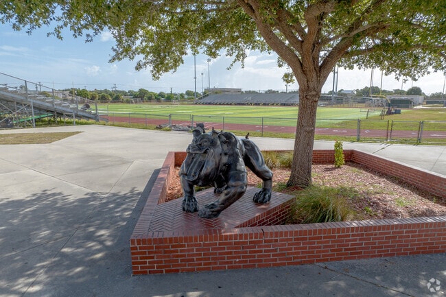 A statue of Melbourne High School's mascot sits outside of its football stadium.