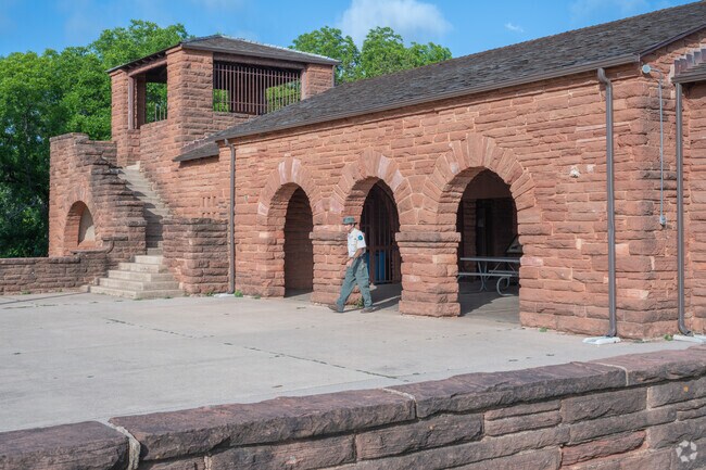 Rangers walk Abilene State Park's timeless architecture and stories outside Potosi City.