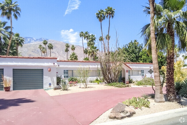 Red tiles line the edges of this flat-roofed ranch home in Deepwell Estates.