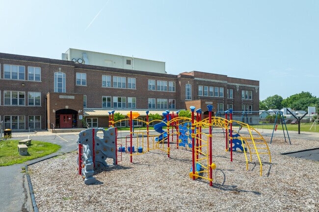 Harvard Park Elementary School features a full sized playground for students to play.