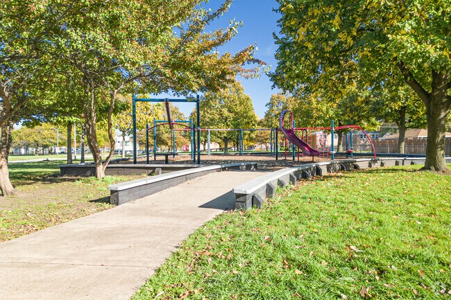Kids flock to the playground at LeClaire-Hearst Park.