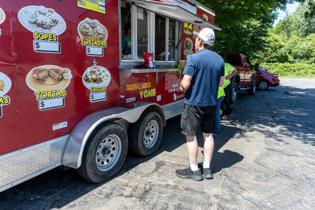 You can stop by and pick up lunch from the food trucks within the Forest Hills neighborhood.