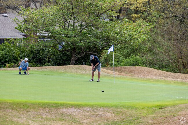 Enjoying a day on the green, perfecting their swing on a perfect day in Horseshoe Bend Country Club.