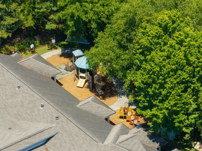 Guidepost Montessori at Deerfield has a playground on ether side of the school that is shaded.