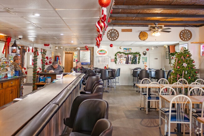 Locals gather at Hideaway Bar for drinks and conversation.