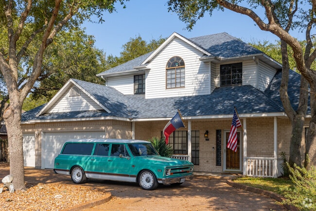 A classic car and picturesque traditional home located in Rockport.