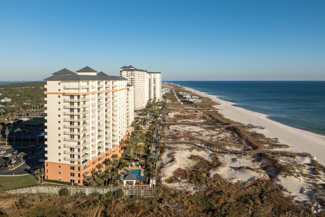 Catch the sunrise and serenity on an early morning beach walk.