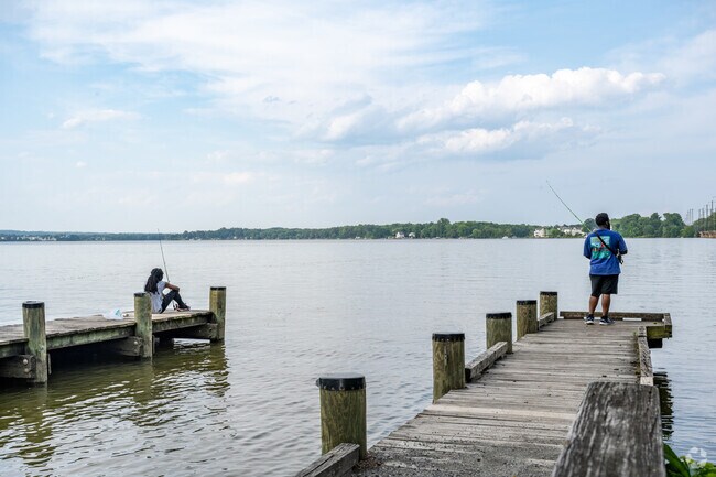 Go fishing with a friend on a dock in the Long Bar Harbor neighborhood.