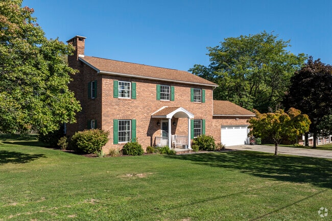 Colonial Revival homes in Upper Yoder sit on tree-shaded lots.