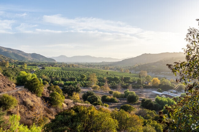A peaceful farm sits beneath the hills surrounding Fillmore.