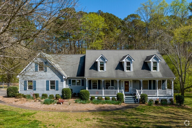 Homes in Alpharetta often feature spacious yards and front porches.