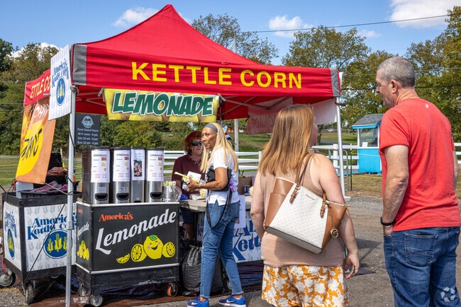 Revelers line up for freshly popped kettle corn at Norz Hill Farm Farmers Market in Branchburg.