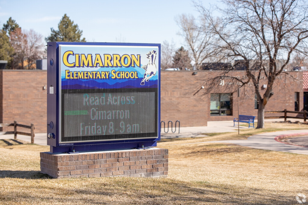 Cimarron Elementary School sign welcomes students to the school.