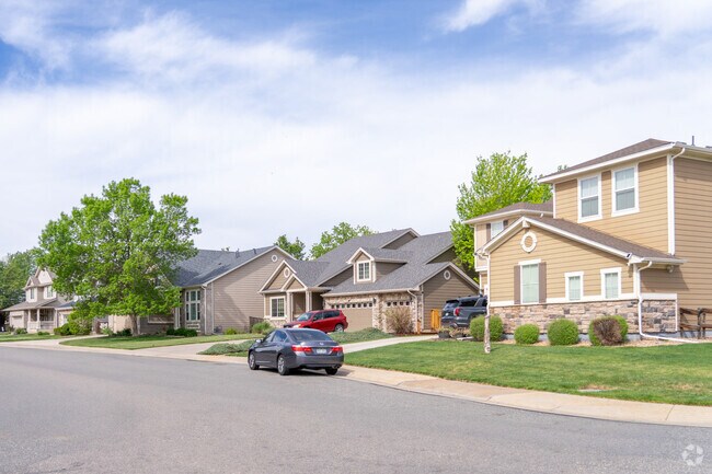 A stylish stretch of modern traditional homes, where timeless porches, pitched roofs, and fresh design create a picture-perfect streetscape.
