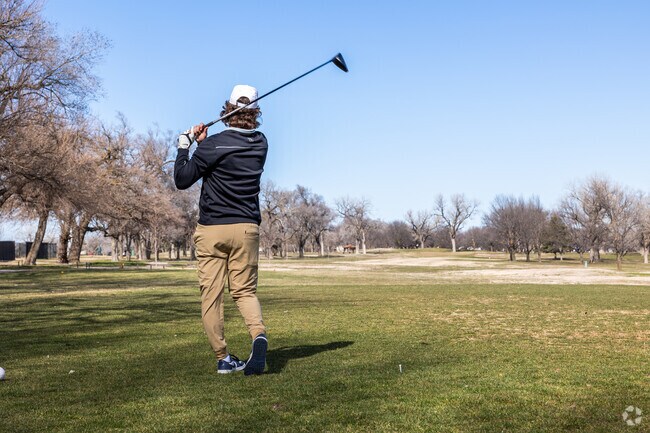 Practice your golf swing at the MacDonald Golf Course by North Central.