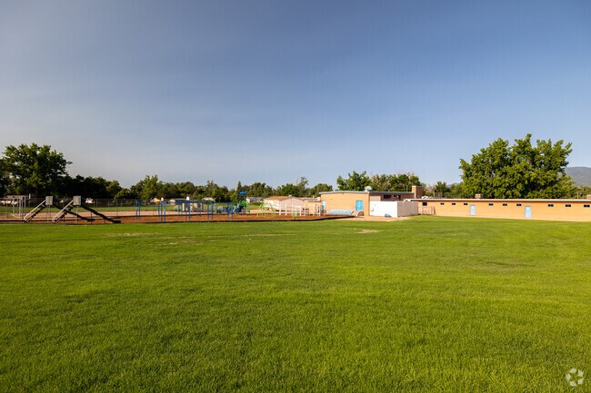 Students play tag on the field at Venetucci Elementary School in Fountain Valley Ranch.