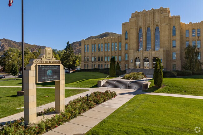 The front of Ogden High School has beautiful green lawns.