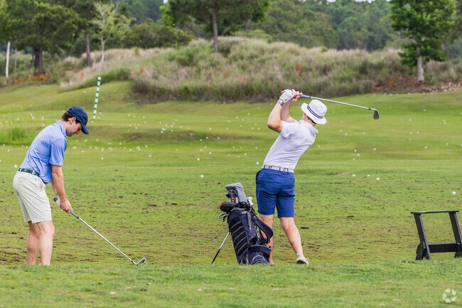 Rivertowne residents love to tee it up with friends at the Rivertowne Country Club golf course.