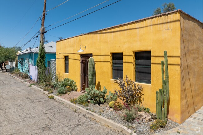Sonoran, adobe-style homes with pops of color are beloved in Barrio Santa Rosa.