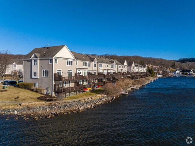 People are able to enjoy lakefront living in luxury townhomes.