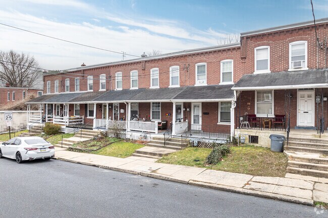 Red brick rowhomes are typical of what you'll find along many West End streets.