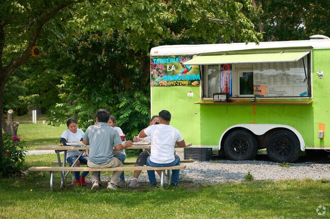 Residents enjoy lunch at a local taco truck just outside Onancock.