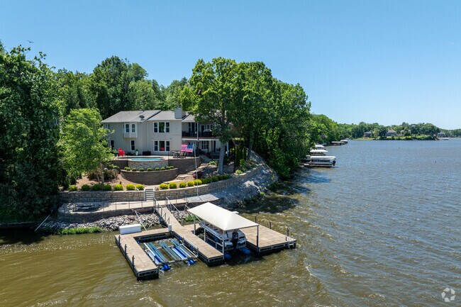 Lake front homes in Lake Saint Louis often have private boat docks.