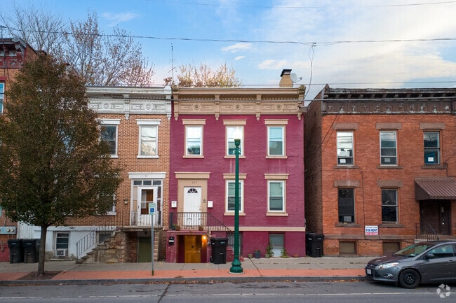 Colorful brownstones in The Hill add charm and vibrance to the neighborhood.