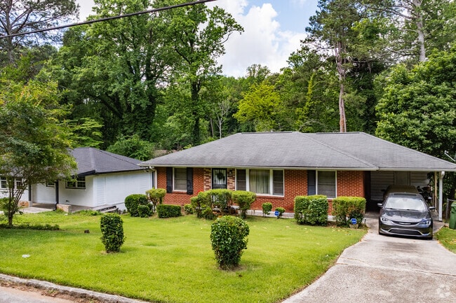 Neatly manicured lawns and low-slung ranch homes define the residential charm of Rosedale Heights.