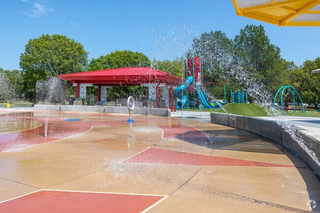 Refreshing fun awaits at McClough Park's splash pad, a vibrant oasis in Meadows.