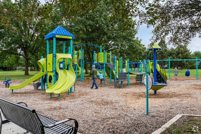 Let the kids run around at the playground in Robeson Park.