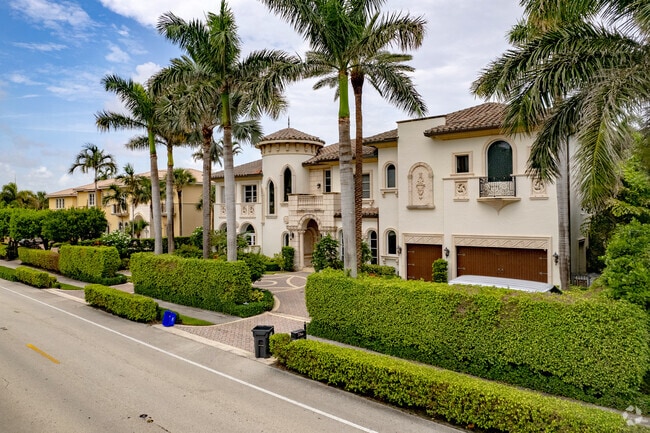 Mediterranean influenced homes line the main road through town in Highland Beach, FL.