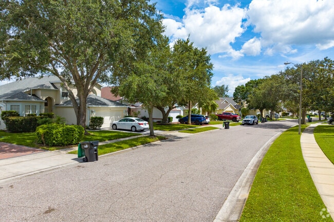 Bungalow style homes in Hunters Creek offer colorful exteriors on quiet suburban streets.