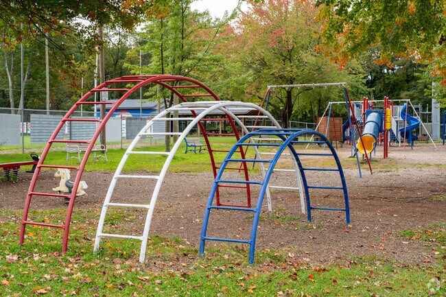 The playground at the Dupont Borough Park boasts play structures for children.