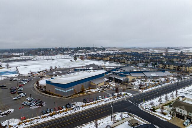 Cheney Middle School features a large parking lot for visitors and staff.